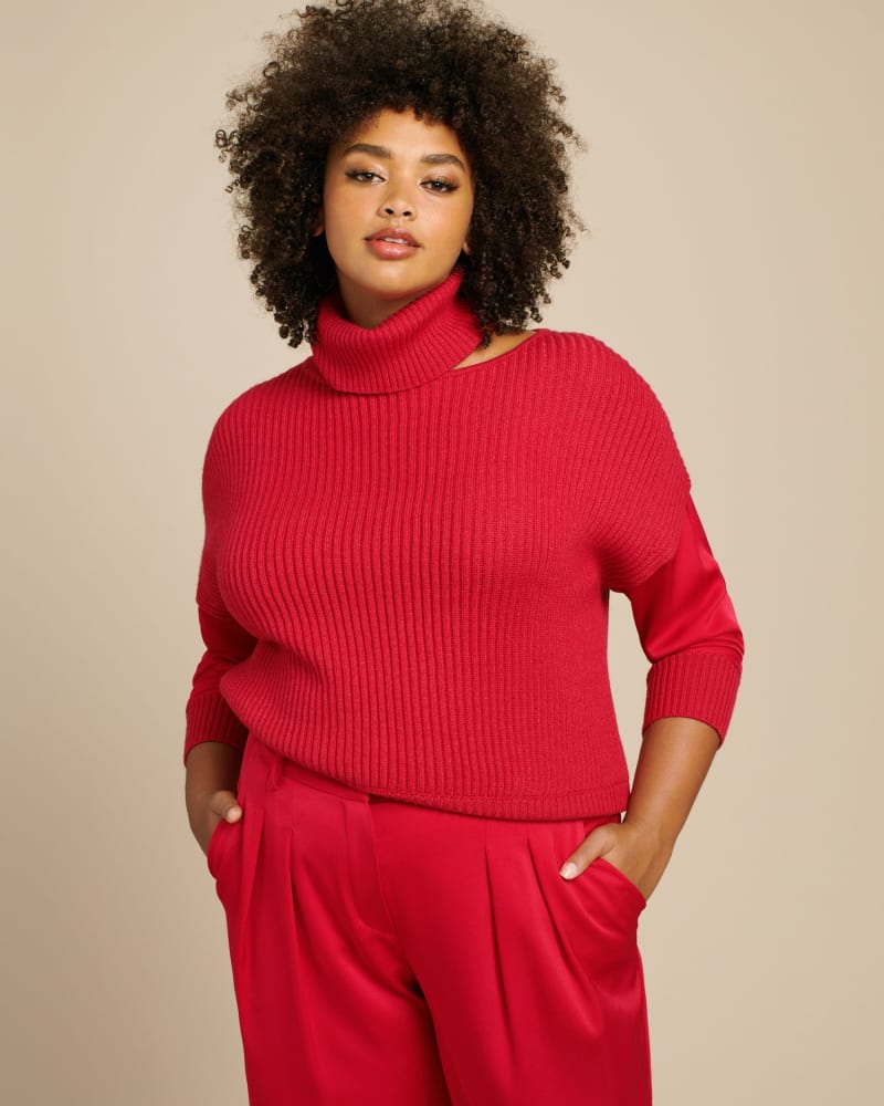 Front of a model wearing a size 2 WUKA Sweater in Lipstick by WINGATE. | dia_product_style_image_id:231139